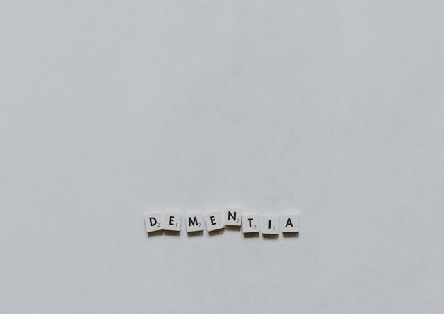 white and yellow letter t